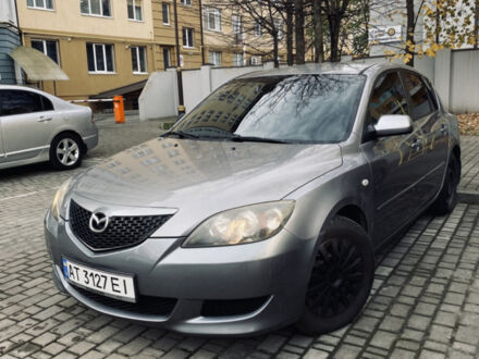 Серый Мазда 3, объемом двигателя 1.35 л и пробегом 304 тыс. км за 3500 $, фото 1 на Automoto.ua