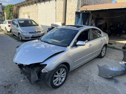 Серый Мазда 3, объемом двигателя 1.6 л и пробегом 168 тыс. км за 2450 $, фото 1 на Automoto.ua