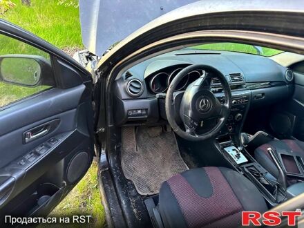 Серый Мазда 3, объемом двигателя 1.6 л и пробегом 200 тыс. км за 1000 $, фото 1 на Automoto.ua
