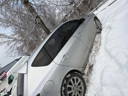 Серый Мазда 3, объемом двигателя 1.6 л и пробегом 235 тыс. км за 3131 $, фото 1 на Automoto.ua