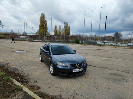 Серый Мазда 3, объемом двигателя 1.6 л и пробегом 250 тыс. км за 4000 $, фото 1 на Automoto.ua