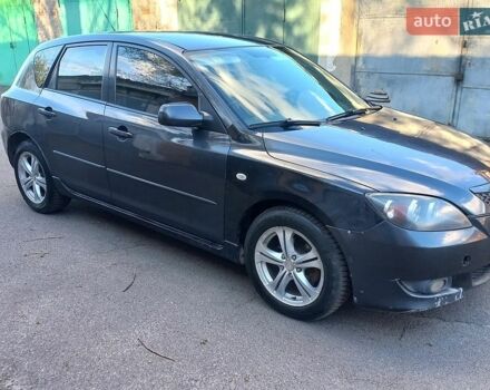 Серый Мазда 3, объемом двигателя 1.6 л и пробегом 265 тыс. км за 3200 $, фото 1 на Automoto.ua