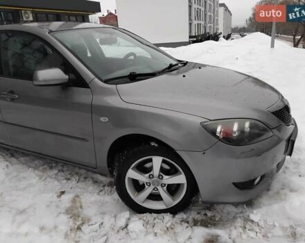 Серый Мазда 3, объемом двигателя 1.6 л и пробегом 312 тыс. км за 4000 $, фото 1 на Automoto.ua