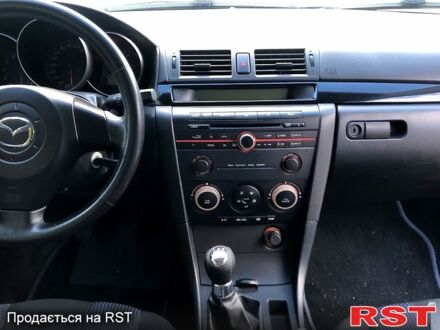 Серый Мазда 3, объемом двигателя 1.6 л и пробегом 292 тыс. км за 5000 $, фото 1 на Automoto.ua