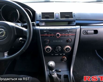 Серый Мазда 3, объемом двигателя 1.6 л и пробегом 292 тыс. км за 5000 $, фото 1 на Automoto.ua