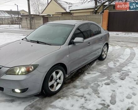 Сірий Мазда 3, об'ємом двигуна 1.6 л та пробігом 297 тис. км за 4399 $, фото 1 на Automoto.ua