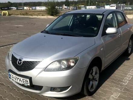 Серый Мазда 3, объемом двигателя 1.3 л и пробегом 235 тыс. км за 3400 $, фото 1 на Automoto.ua