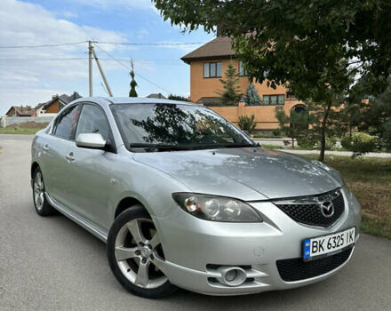 Сірий Мазда 3, об'ємом двигуна 2 л та пробігом 310 тис. км за 3900 $, фото 1 на Automoto.ua