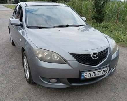 Серый Мазда 3, объемом двигателя 1.6 л и пробегом 296 тыс. км за 3588 $, фото 1 на Automoto.ua