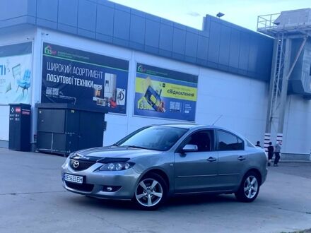 Серый Мазда 3, объемом двигателя 1.6 л и пробегом 198 тыс. км за 4999 $, фото 1 на Automoto.ua