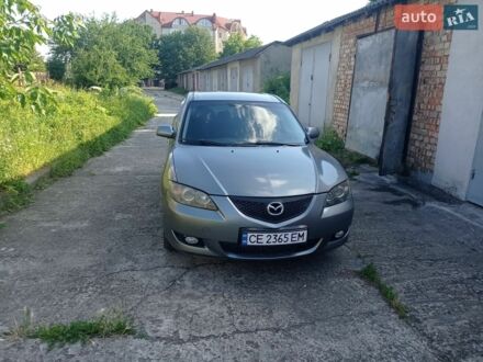 Серый Мазда 3, объемом двигателя 1.6 л и пробегом 196 тыс. км за 4450 $, фото 1 на Automoto.ua