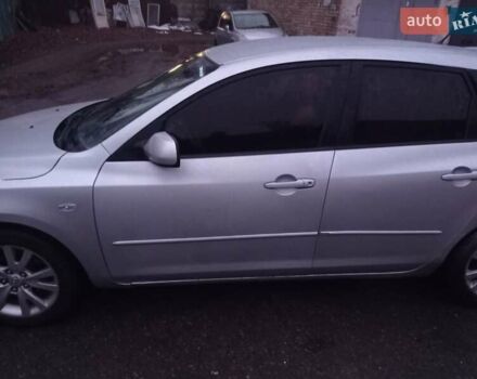 Серый Мазда 3, объемом двигателя 1.6 л и пробегом 140 тыс. км за 3900 $, фото 1 на Automoto.ua