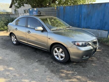 Серый Мазда 3, объемом двигателя 1.6 л и пробегом 270 тыс. км за 4500 $, фото 1 на Automoto.ua