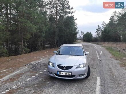 Серый Мазда 3, объемом двигателя 1.6 л и пробегом 296 тыс. км за 4700 $, фото 1 на Automoto.ua