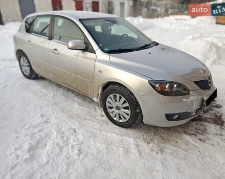 Серый Мазда 3, объемом двигателя 1.6 л и пробегом 118 тыс. км за 5599 $, фото 1 на Automoto.ua