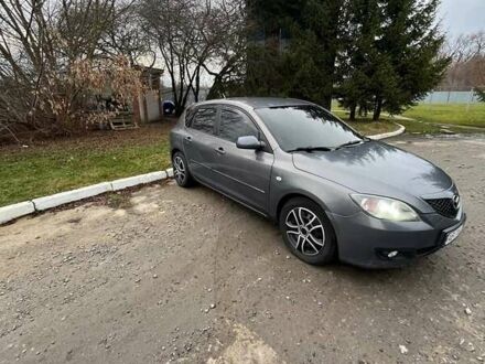 Сірий Мазда 3, об'ємом двигуна 2 л та пробігом 302 тис. км за 4200 $, фото 1 на Automoto.ua