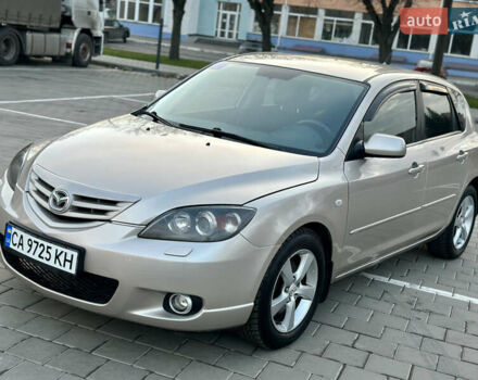 Серый Мазда 3, объемом двигателя 2 л и пробегом 220 тыс. км за 4300 $, фото 1 на Automoto.ua