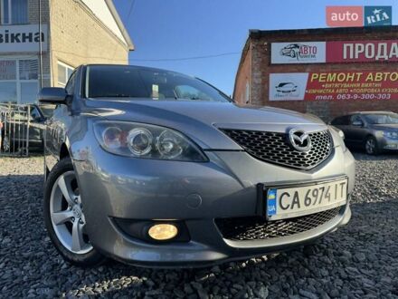 Серый Мазда 3, объемом двигателя 1.6 л и пробегом 215 тыс. км за 4950 $, фото 1 на Automoto.ua