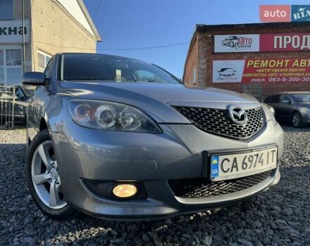 Серый Мазда 3, объемом двигателя 1.6 л и пробегом 215 тыс. км за 4950 $, фото 1 на Automoto.ua