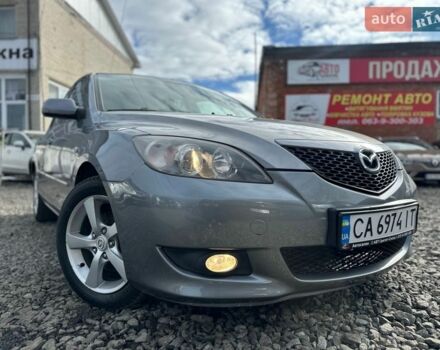 Серый Мазда 3, объемом двигателя 1.6 л и пробегом 216 тыс. км за 4700 $, фото 1 на Automoto.ua