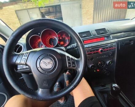 Сірий Мазда 3, об'ємом двигуна 2 л та пробігом 221 тис. км за 4900 $, фото 1 на Automoto.ua