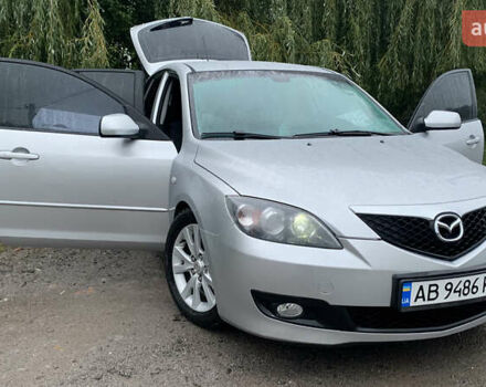 Серый Мазда 3, объемом двигателя 1.6 л и пробегом 157 тыс. км за 4950 $, фото 1 на Automoto.ua