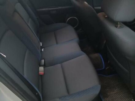 Серый Мазда 3, объемом двигателя 2 л и пробегом 300 тыс. км за 4500 $, фото 1 на Automoto.ua