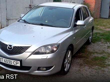 Серый Мазда 3, объемом двигателя 2 л и пробегом 230 тыс. км за 3100 $, фото 1 на Automoto.ua