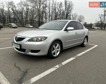 Серый Мазда 3, объемом двигателя 1.6 л и пробегом 127 тыс. км за 4900 $, фото 1 на Automoto.ua