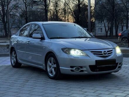 Сірий Мазда 3, об'ємом двигуна 2 л та пробігом 205 тис. км за 4350 $, фото 1 на Automoto.ua