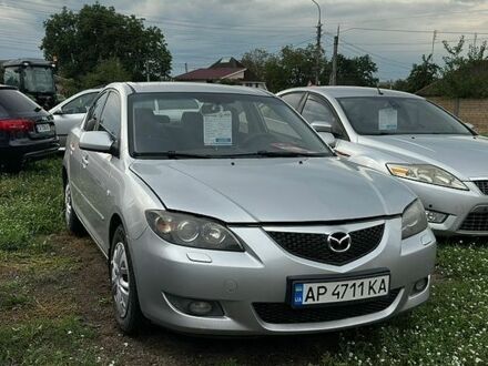 Серый Мазда 3, объемом двигателя 1.6 л и пробегом 305 тыс. км за 3900 $, фото 1 на Automoto.ua