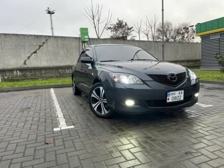 Серый Мазда 3, объемом двигателя 1.6 л и пробегом 220 тыс. км за 5000 $, фото 1 на Automoto.ua