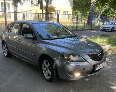 Серый Мазда 3, объемом двигателя 1.6 л и пробегом 250 тыс. км за 1850 $, фото 1 на Automoto.ua
