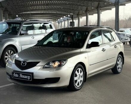 Серый Мазда 3, объемом двигателя 1.35 л и пробегом 236 тыс. км за 4999 $, фото 1 на Automoto.ua