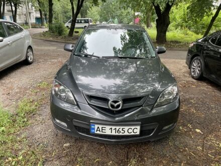 Серый Мазда 3, объемом двигателя 2 л и пробегом 266 тыс. км за 3004 $, фото 1 на Automoto.ua