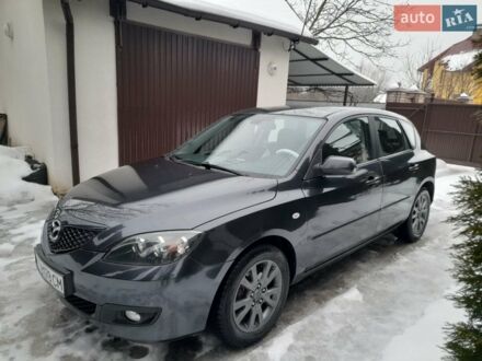 Серый Мазда 3, объемом двигателя 1.56 л и пробегом 246 тыс. км за 4200 $, фото 1 на Automoto.ua