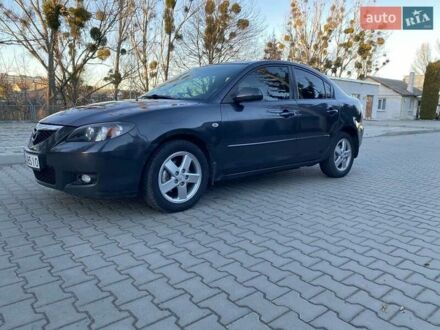 Серый Мазда 3, объемом двигателя 1.6 л и пробегом 170 тыс. км за 5250 $, фото 1 на Automoto.ua