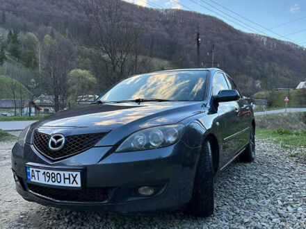 Серый Мазда 3, объемом двигателя 1.6 л и пробегом 248 тыс. км за 4600 $, фото 1 на Automoto.ua