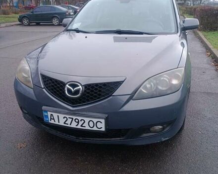 Серый Мазда 3, объемом двигателя 1.56 л и пробегом 269 тыс. км за 5200 $, фото 1 на Automoto.ua