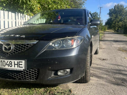 Серый Мазда 3, объемом двигателя 1.6 л и пробегом 222 тыс. км за 5900 $, фото 1 на Automoto.ua