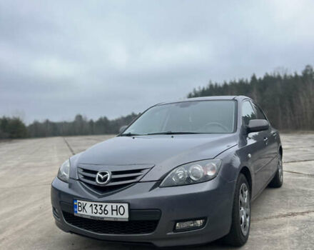 Серый Мазда 3, объемом двигателя 2 л и пробегом 298 тыс. км за 5600 $, фото 1 на Automoto.ua