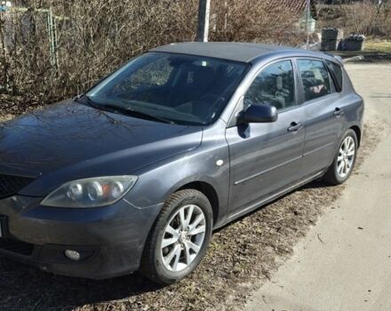 Серый Мазда 3, объемом двигателя 1.6 л и пробегом 301 тыс. км за 4200 $, фото 1 на Automoto.ua