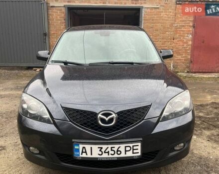Серый Мазда 3, объемом двигателя 1.6 л и пробегом 153 тыс. км за 6000 $, фото 1 на Automoto.ua