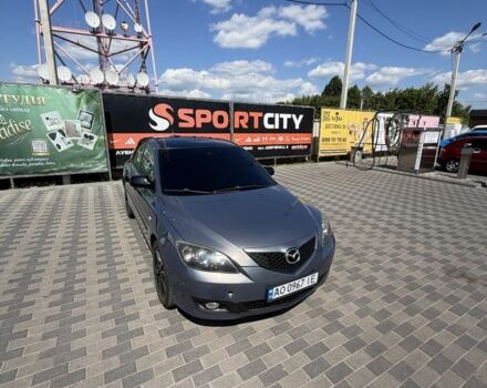 Серый Мазда 3, объемом двигателя 2 л и пробегом 299 тыс. км за 4200 $, фото 1 на Automoto.ua