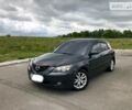 Серый Мазда 3, объемом двигателя 1.6 л и пробегом 103 тыс. км за 7900 $, фото 1 на Automoto.ua