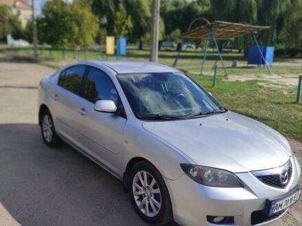 Серый Мазда 3, объемом двигателя 1.6 л и пробегом 242 тыс. км за 4400 $, фото 1 на Automoto.ua