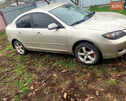 Серый Мазда 3, объемом двигателя 2 л и пробегом 307 тыс. км за 5250 $, фото 1 на Automoto.ua