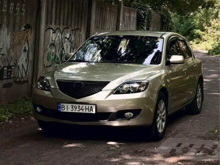 Серый Мазда 3, объемом двигателя 1.6 л и пробегом 158 тыс. км за 4800 $, фото 1 на Automoto.ua