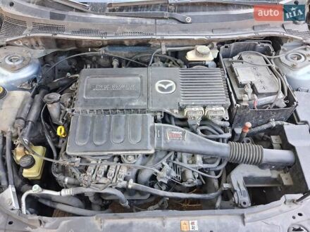 Серый Мазда 3, объемом двигателя 1.6 л и пробегом 266 тыс. км за 5000 $, фото 1 на Automoto.ua