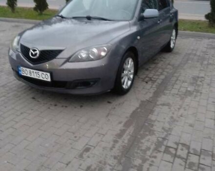 Серый Мазда 3, объемом двигателя 1.6 л и пробегом 128 тыс. км за 4850 $, фото 1 на Automoto.ua